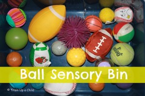 Sensory bin with lots of shapes and colors of balls